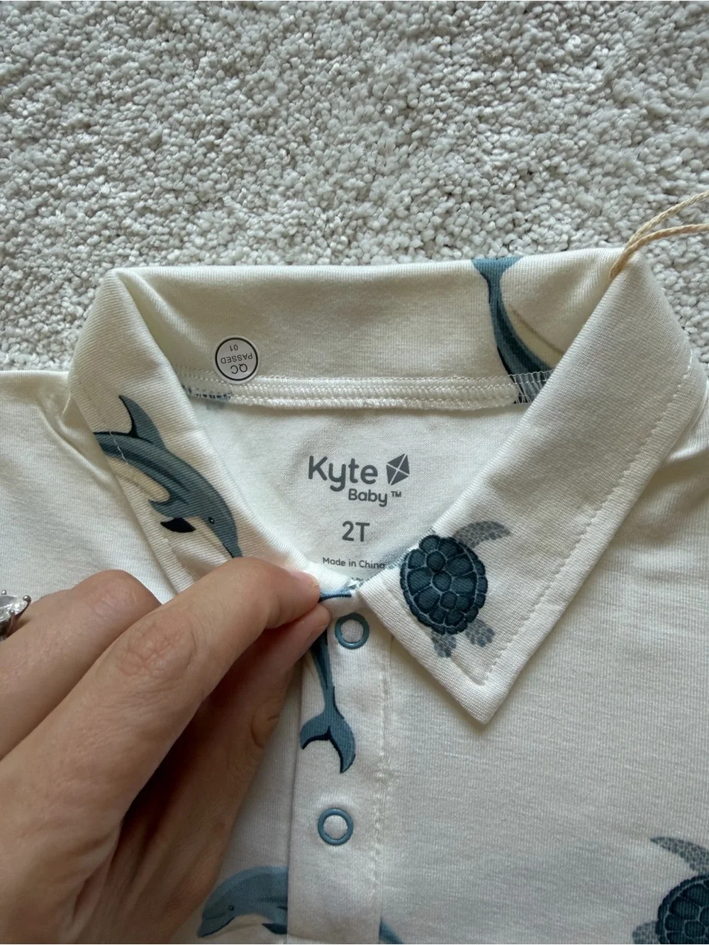 Kyte BABY Cream Short Sleeve Romper with Blue Dolphins & Navy Turtles